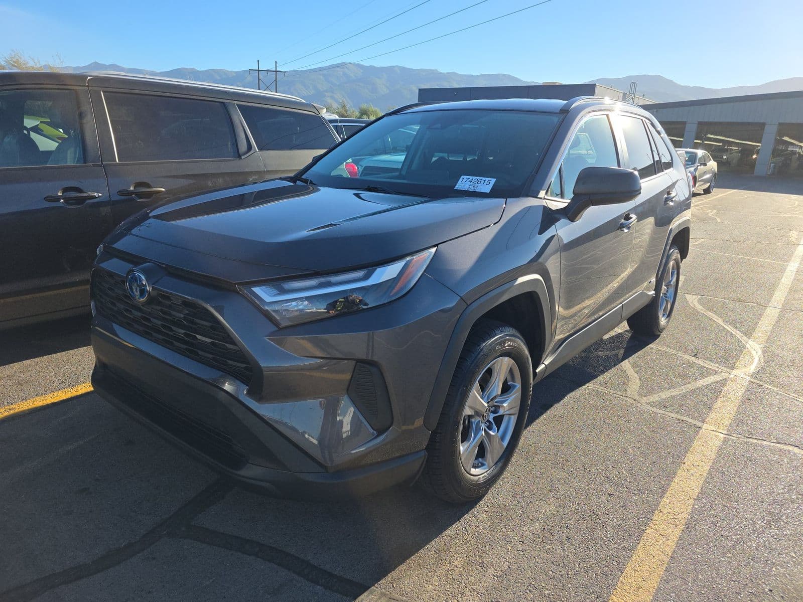 2024 Toyota RAV4 HYBRID LE · Dealer-auction research source vehicle